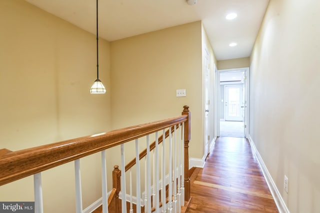 hallway featuring hardwood / wood-style flooring