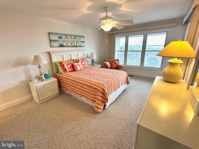 bedroom featuring ceiling fan and carpet floors