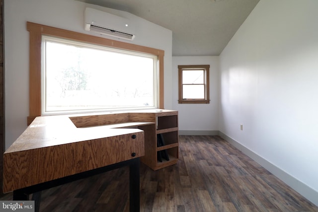 bathroom with hardwood / wood-style flooring, lofted ceiling, and an AC wall unit