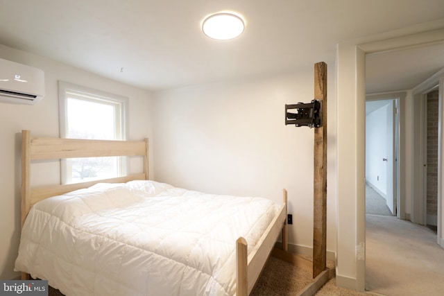 bedroom featuring carpet floors and an AC wall unit