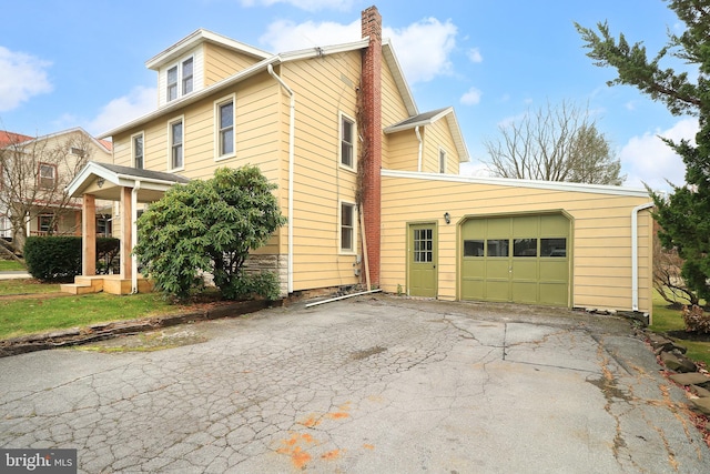 view of home's exterior featuring a garage