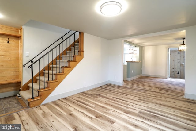 unfurnished living room with light hardwood / wood-style flooring