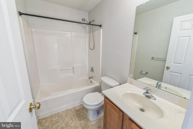 full bathroom with tile patterned flooring, vanity, bathing tub / shower combination, and toilet