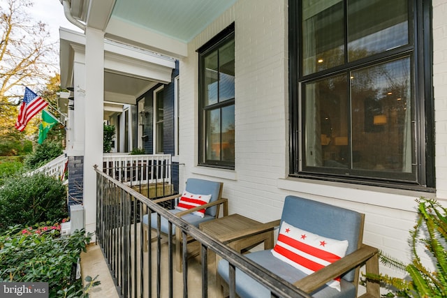 balcony featuring a porch