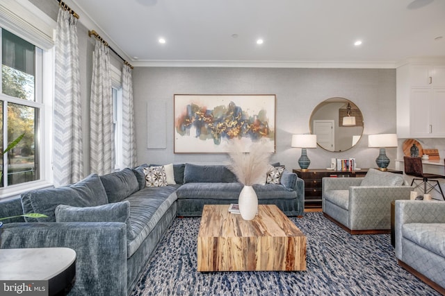 living room featuring crown molding