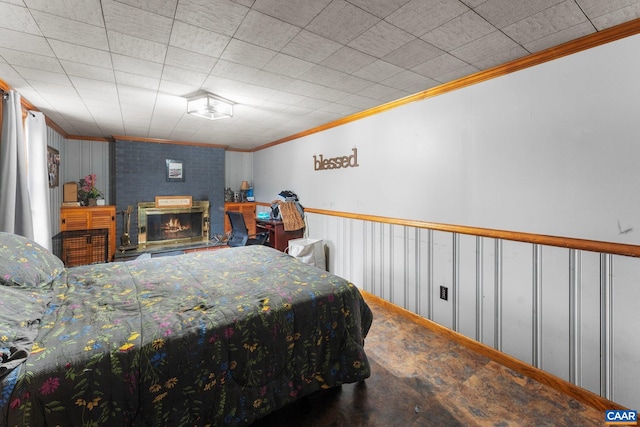 bedroom featuring a fireplace and crown molding