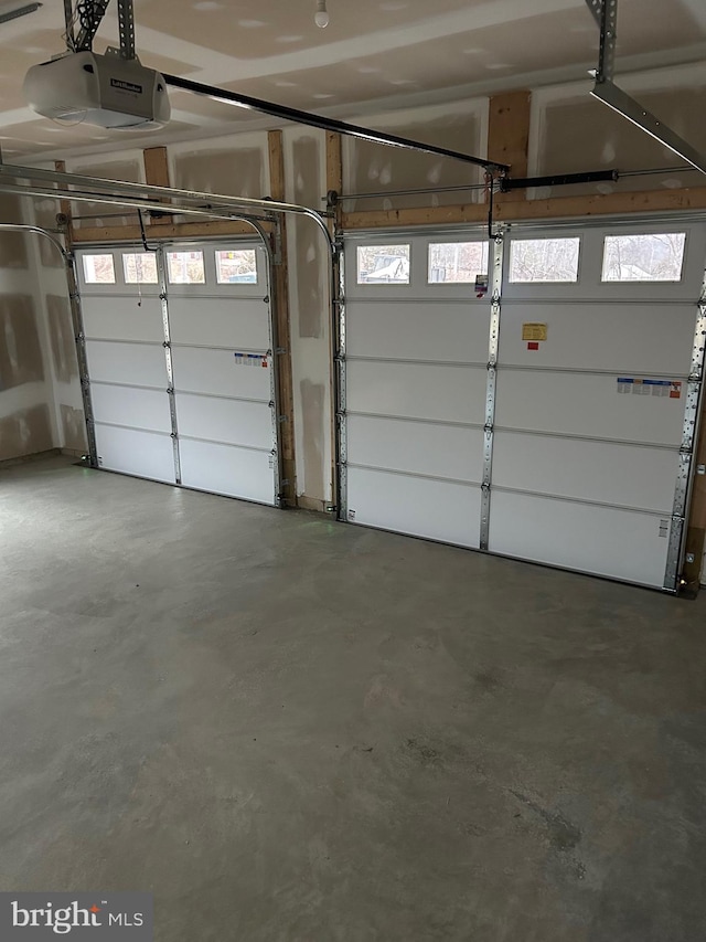 garage featuring a garage door opener