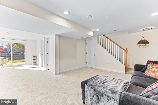 living room featuring light carpet