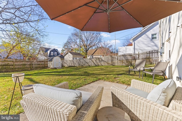 view of patio / terrace with a storage unit