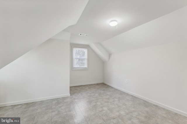 bonus room featuring lofted ceiling