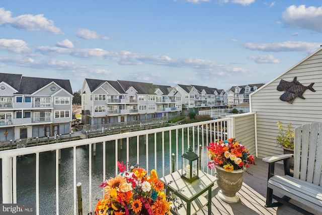 balcony featuring a water view