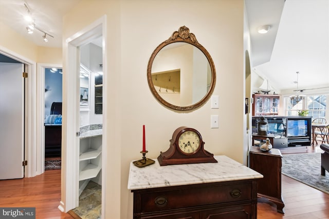 hall with light hardwood / wood-style flooring