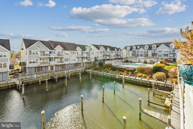 property view of water featuring a dock