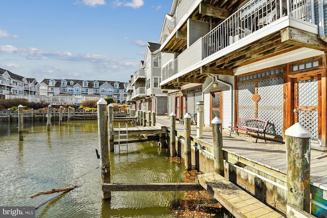 dock area featuring a water view