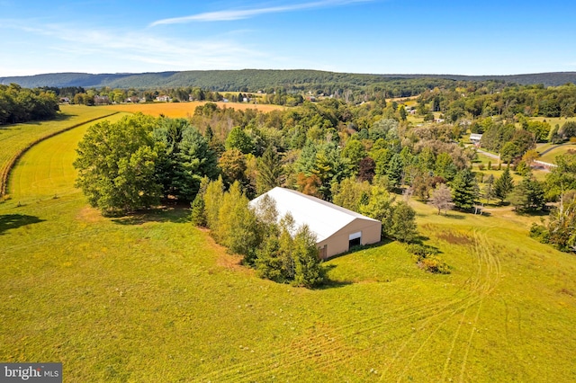 bird's eye view with a mountain view and a rural view