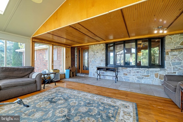 living room featuring wooden ceiling and wood-type flooring