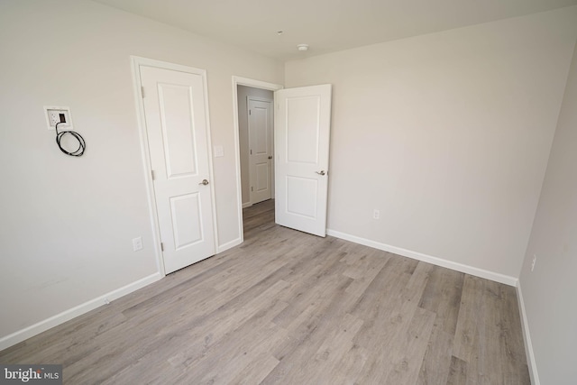 unfurnished bedroom featuring light hardwood / wood-style floors