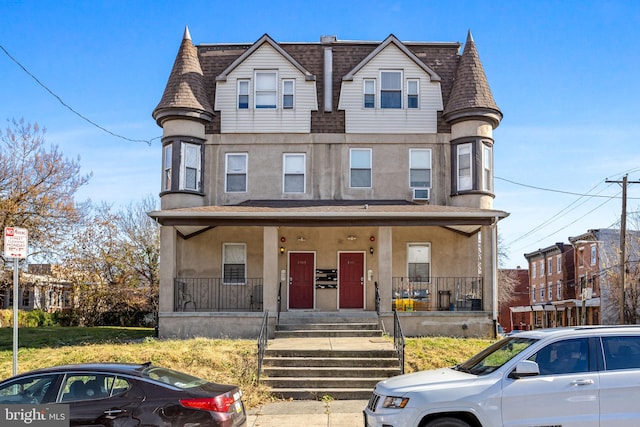 victorian-style house with covered porch