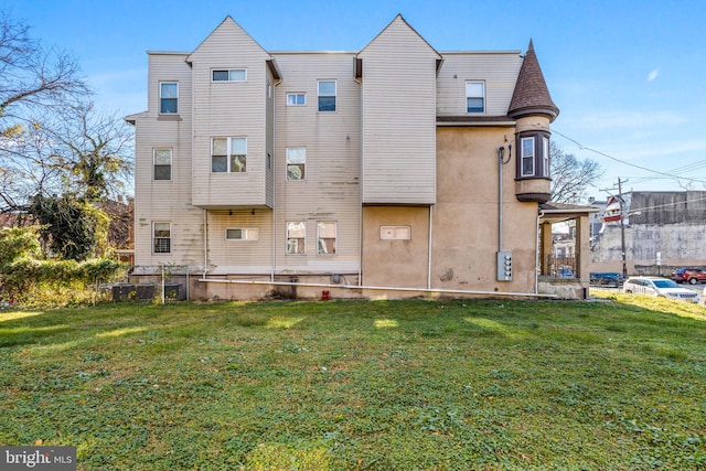 3301-03 N 16th St, Philadelphia, PA 19140 - rear view of property featuring a lawn