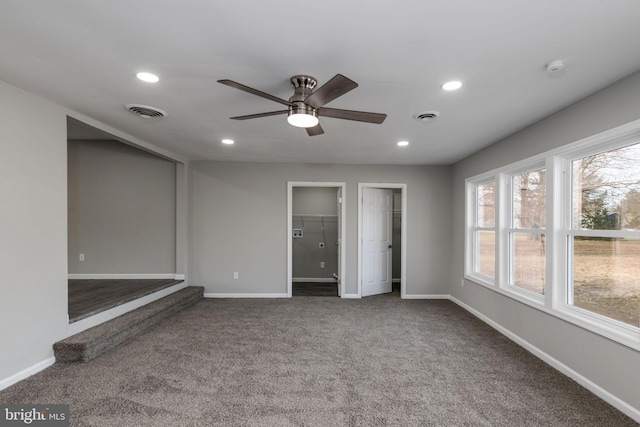 unfurnished bedroom featuring carpet flooring and ceiling fan