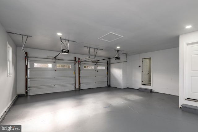 garage featuring a garage door opener