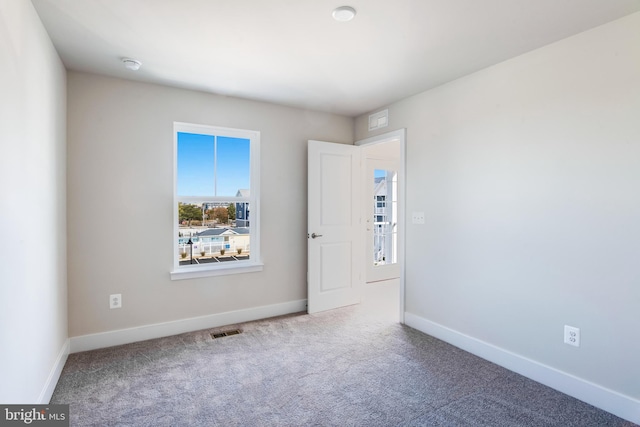 view of carpeted spare room