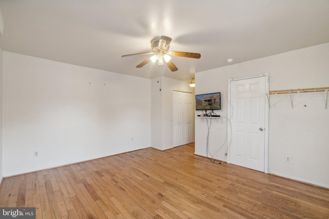 unfurnished bedroom featuring light hardwood / wood-style floors and ceiling fan