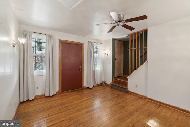 entrance foyer with light wood-type flooring and ceiling fan