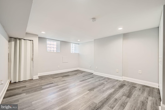 basement with light wood-type flooring