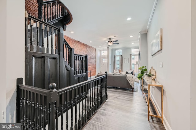 interior space with ceiling fan