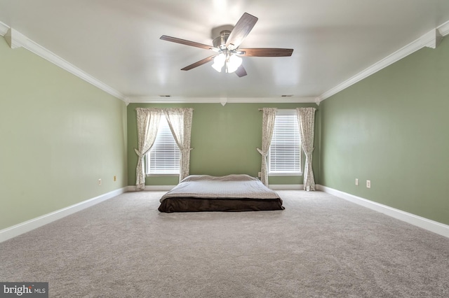 bedroom featuring carpet floors, ceiling fan, and ornamental molding