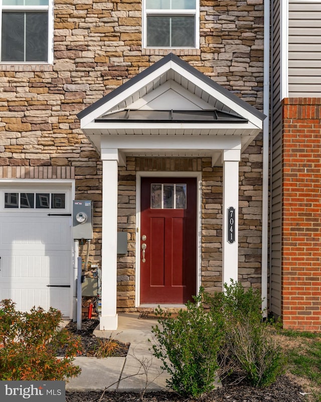 entrance to property with a garage