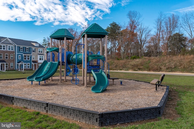 view of play area featuring a lawn