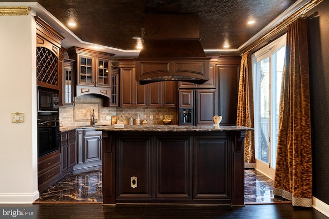 kitchen with dark hardwood / wood-style floors, backsplash, dark stone counters, black appliances, and crown molding