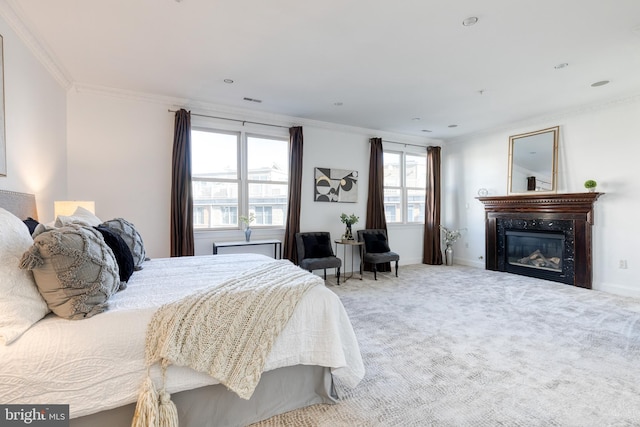 bedroom with crown molding and carpet floors