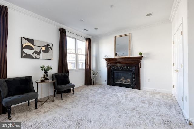 living area with light carpet and crown molding