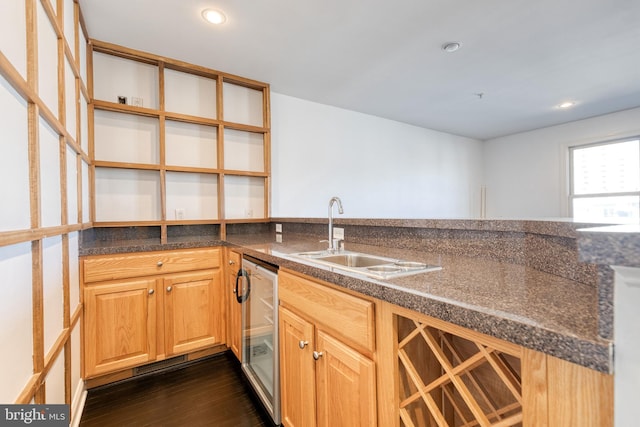 kitchen featuring wine cooler, dark hardwood / wood-style floors, and sink