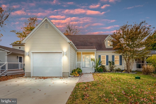 13801 Fountain Rd, Ocean City, MD 21842 - view of front of home with concrete driveway, a lawn, and a garage