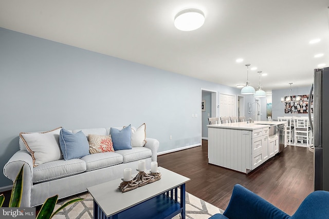 13801 Fountain Rd, Ocean City, MD 21842 - living room with dark wood-type flooring, recessed lighting, and baseboards