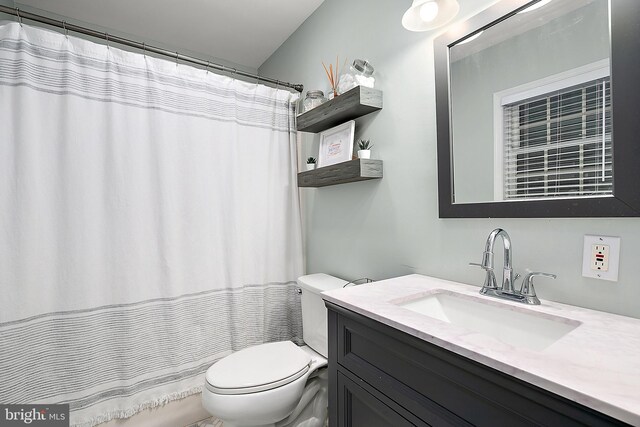 13801 Fountain Rd, Ocean City, MD 21842 - full bath with toilet, vanity, and curtained shower