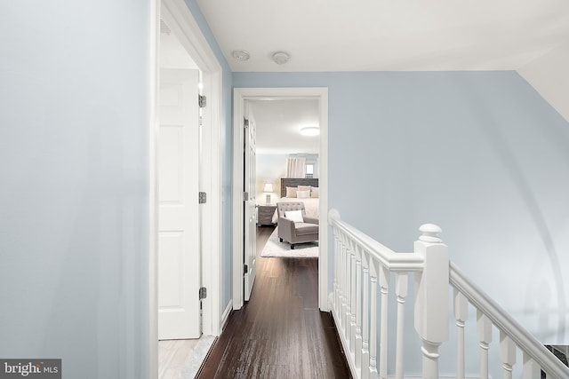 13801 Fountain Rd, Ocean City, MD 21842 - hallway featuring an upstairs landing and dark wood-style floors