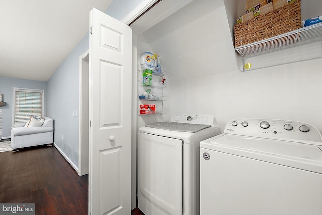 laundry room featuring dark hardwood / wood-style flooring and separate washer and dryer