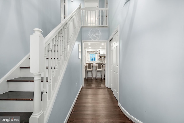 stairway with wood-type flooring