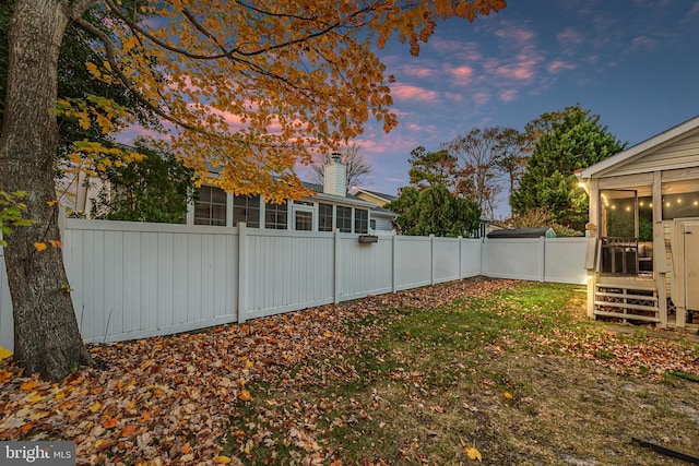 13801 Fountain Rd, Ocean City, MD 21842 - fenced backyard with a sunroom