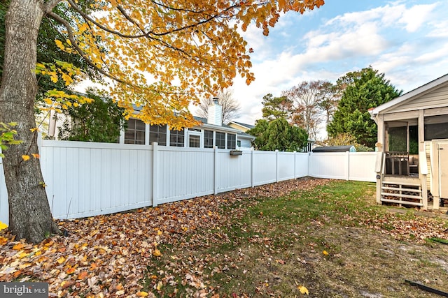 13801 Fountain Rd, Ocean City, MD 21842 - fenced backyard featuring a sunroom
