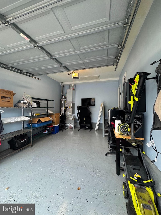 garage with gas water heater, heating unit, and a garage door opener