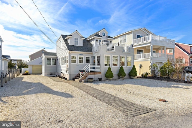 view of front of home with a balcony