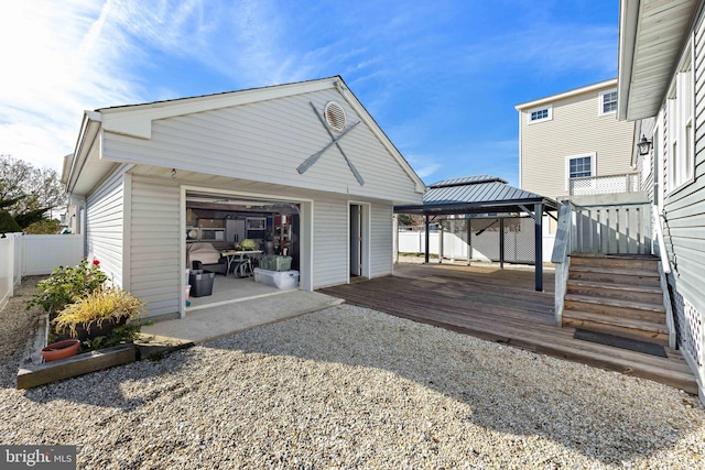 exterior space with a gazebo and a deck