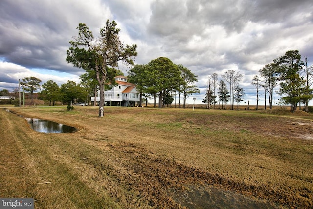 view of yard with a water view