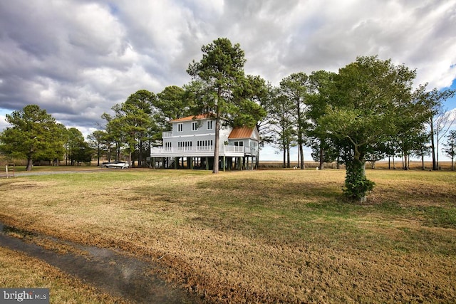 view of yard featuring a wooden deck